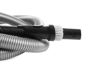 Vacuum cleaner brush and hose on white background