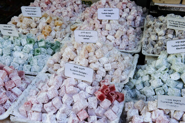 Variety of Turkish Delight, a candy sweet consisting of chopped dates, pistachios, hazelnuts or walnuts and bound by a sugary gelatin.
