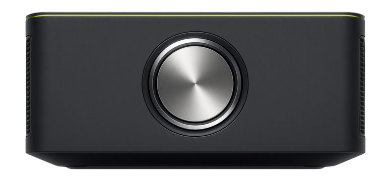 Gaming console featuring a large circular power button and matte finish