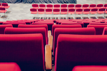 Fototapeta premium red chair row in a convention centre