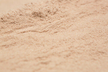 Brown powder textured background. Concept of nutritional supplement, dieting, detox, preventive healthcare and healthy lifestyle.	
