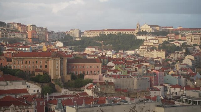 Panoramic view of Lisbon and castle from Miradouro de SALo Pedro de AlcA?ntara at sunset, Lisbon, Portugal, Europe