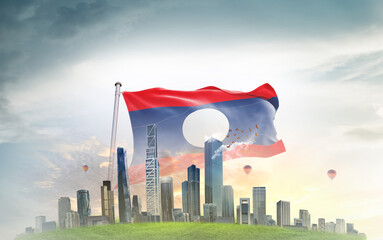 Laos national flag wavering with modern building skyline. Country showing stronger and prosperity....