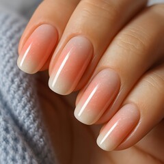 Natural Ombre Gel Manicure on Female Hand with Soft Gradient Nails