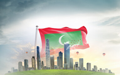 Maldives national flag wavering with modern building skyline. Country showing stronger and...
