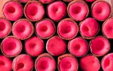 A bunch of firecrackers with red sulfur. Set of pyrotechnics, explosion hazard, macro. Background