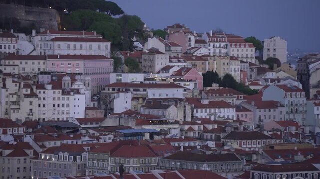 Panoramic view of Lisbon and cathedral from Miradouro de SALo Pedro de AlcA?ntara at dusk, Lisbon, Portugal, Europe