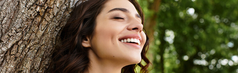 Joyful summer afternoon with a young woman enjoying nature in the park