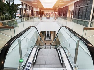 Modern shopping mall with empty escalator