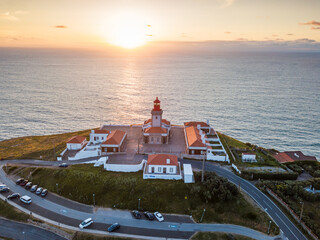Sunset View of Cabo da Roca Lighthouse and Cliffs. Aerial drone veiw