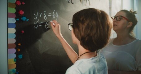 Talented Boy Demonstrating Math Knowledge: Close Up Shot of Primary School Student Solving...