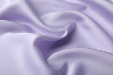 Crumpled violet silk fabric as background, closeup