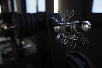 Dumbbells and other equipment in gym, closeup