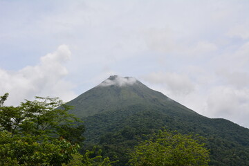 Arenal volcano with clouds on top (Costa Rica).