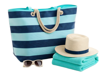 A beach bag with blue stripes next to a hat towels and sunglasses on a black isolated background