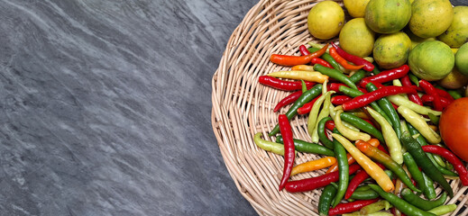 hot chili peppers on wooden background