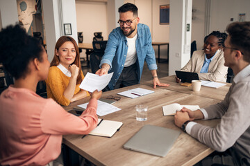 Team Collaborating in a Modern Office Environment