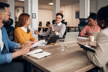 Business Team Engaged in a Collaborative Office Meeting