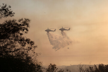 Firefighting Helicopters Drops Water on Wildfire Near Souni Limassol