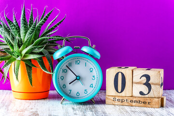 Wooden calendar with the date September 3.Monthly calendar for planning and management concept with...