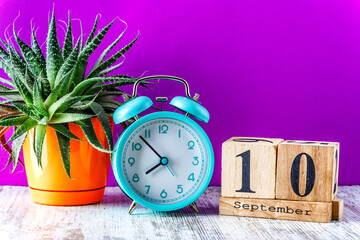 Wooden calendar with the date September 10.Monthly calendar for planning and management concept...