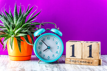 Wooden calendar with the date September 11.Monthly calendar for planning and management concept...