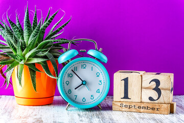 Wooden calendar with the date September 13.Monthly calendar for planning and management concept...