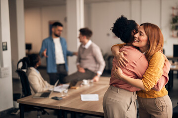 Team Celebrating with Gestures of Support in a Modern Office