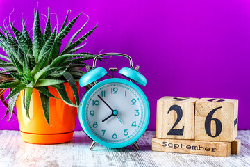 Wooden calendar with the date September 26.Monthly calendar for planning and management concept...