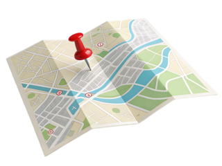 A folded map with streets parks and a river marked by a red pin indicating a specific location
