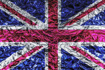 The Union Jack reimagined with a vibrant, crinkled aluminum foil texture. A modern and abstract take on the UK flag, reflecting innovation and a distinct visual appeal