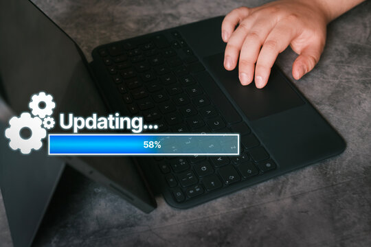 Woman with laptop on desk and virtual installing update bar. Software updates or operating system upgrades. Improved security.