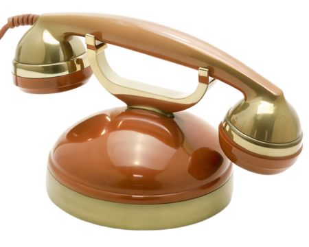 A vintage brown and gold rotary telephone with a coiled cord on a white background in studio lighting