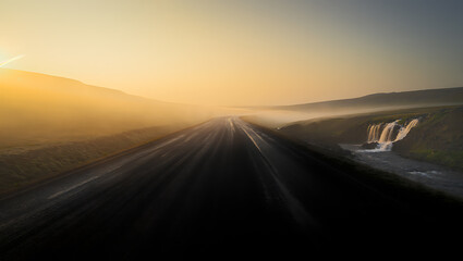 Winding road through misty landscape with cascading waterfall highway asphalt