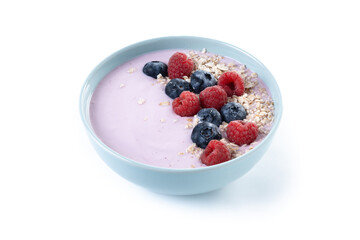 Healthy smoothie bowl with berries isolated on white background
