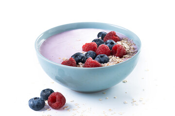 Healthy smoothie bowl with berries isolated on white background