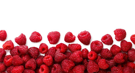 Ripe raspberries scattered close-up on a white background. Top view