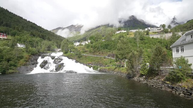 View of waterfall and church in Hellesylt, Sunnylvsfjorden, Stranda Municipality, Norway, Scandinavia, Europe