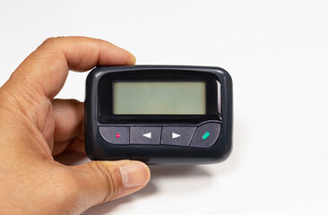 Hand holding One way isolated pager white background with an empty space  blank screen for inscription