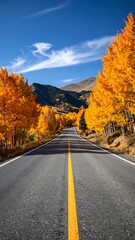 Obraz premium Autumn road through golden aspen trees