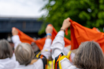 Morris dancers in the village street, Worcestershire, UK. Celebrating the May Day Bank Holiday,...