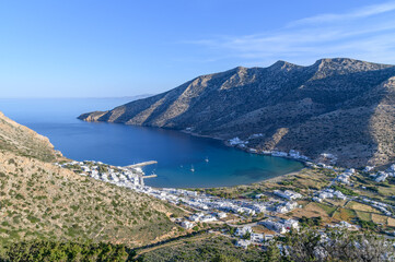 Panoramic view of Kamares village and harbor from hillside, Sifnos Island, Cyclades, Greece