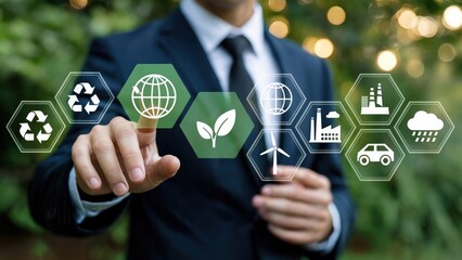 Businessman interacts with green technology icons representing sustainability and eco-friendly business practices
