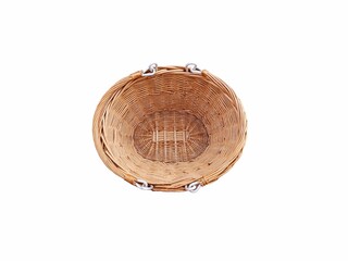 The white background in the picture is a brown woven rattan basket with two handles and a white ring for holding. The weaving pattern is very beautiful and is used in the household to put vegetables.