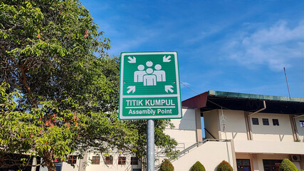 Essential Green Emergency Assembly Point Sign for Public Safety and Disaster Preparedness, Marking...