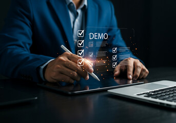 businessman using digital checklist with stylus on tablet for demo task


