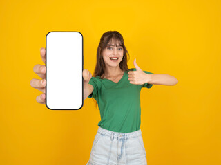 Online mobile offer, portrait of young Caucasian brunette smiling woman hold in hand use mobile...