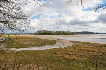 A beautiful seascape of the Grange-Over-Sands and saltmarsh beach on Morecambe Bay in Cumbria, UK.