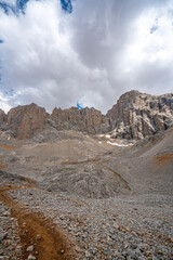 The scenic views of Demirkazık summit, Davlumbaz summit and dipsiz göl at the Aladağlar National park in Niğde, Turkey