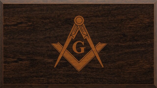 Displaying golden Masonic square and compasses with letter G on wooden plaque mounted on wall